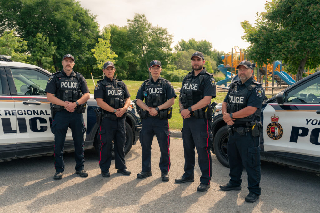 York Regional Police officers from #3 District shown after working together to manage a complex double homicide investigation in Georgina.